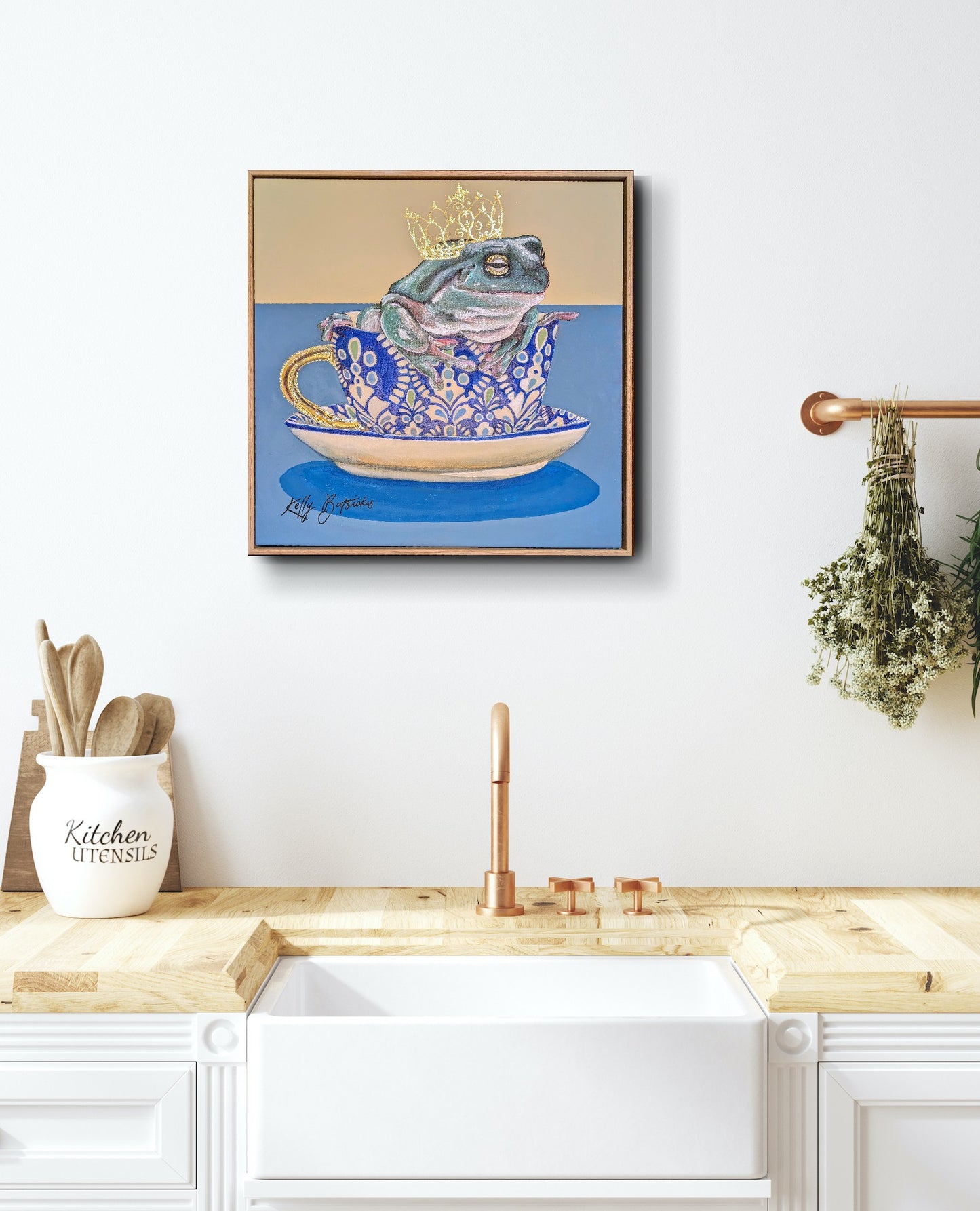 Green tree frog sitting in a patterned T2 teacup with a gold crown, from the Teaparty Series by Australian artist Kelly Batsiokis.