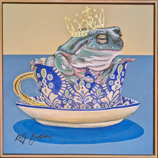 Green tree frog sitting in a patterned T2 teacup with a gold crown, from the Teaparty Series by Australian artist Kelly Batsiokis.
