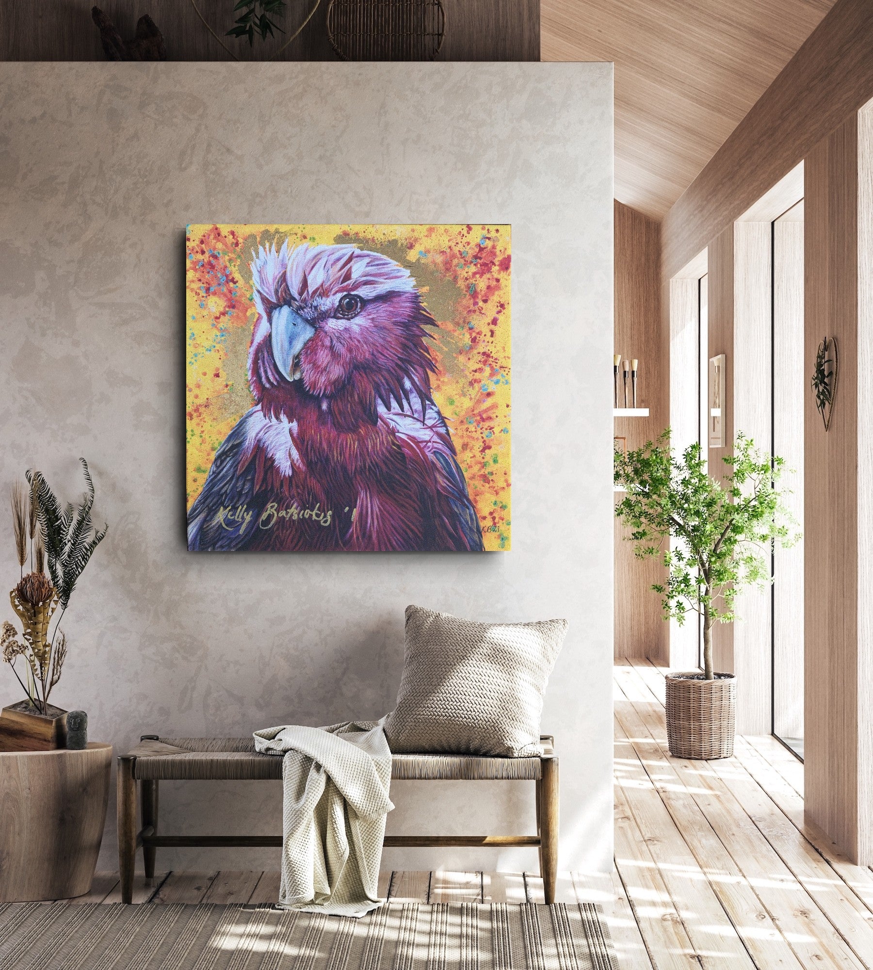 Embellished fine art print of Wally the Galah on a wall in a modern living room to show scale. Please note this is a rolled artwork and will require stretching for presentation/hanging. Additionally, the image has been upscaled from a smaller, embellished print. Therefore, the signature will not be as large to scale - every embellished print is unique.