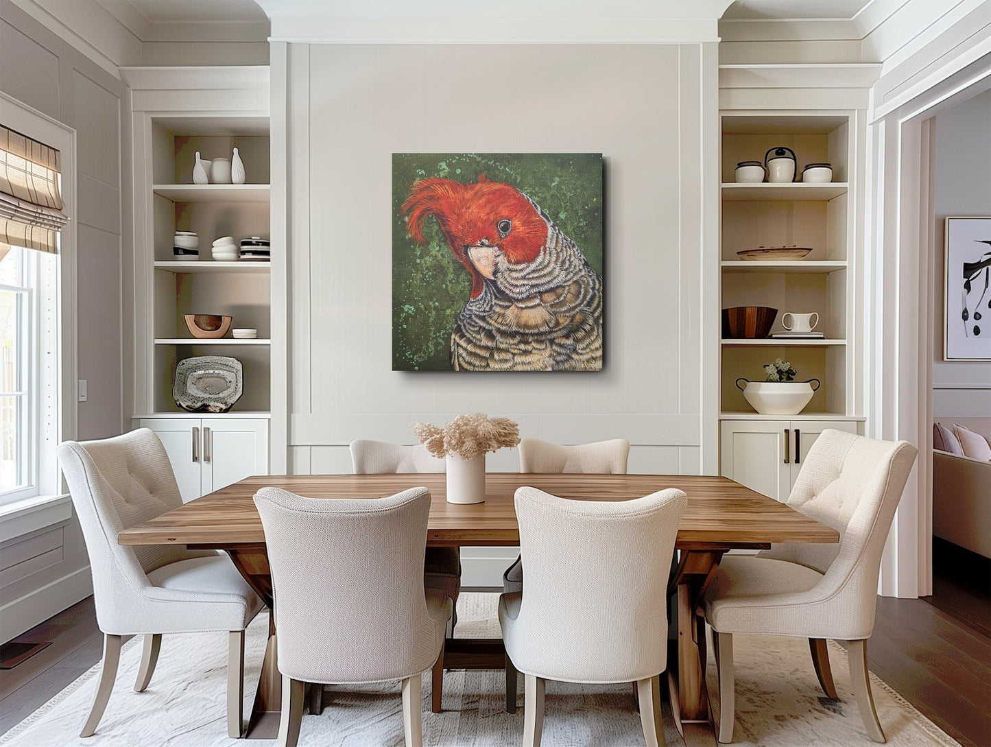 Dining room with wooden table and white chairs, featuring a unframed Elvis Cockatoo Fine Art Print painting on the wall to show scale. Note the artwork is posted rolled and will require stretching for presentation/hanging.
