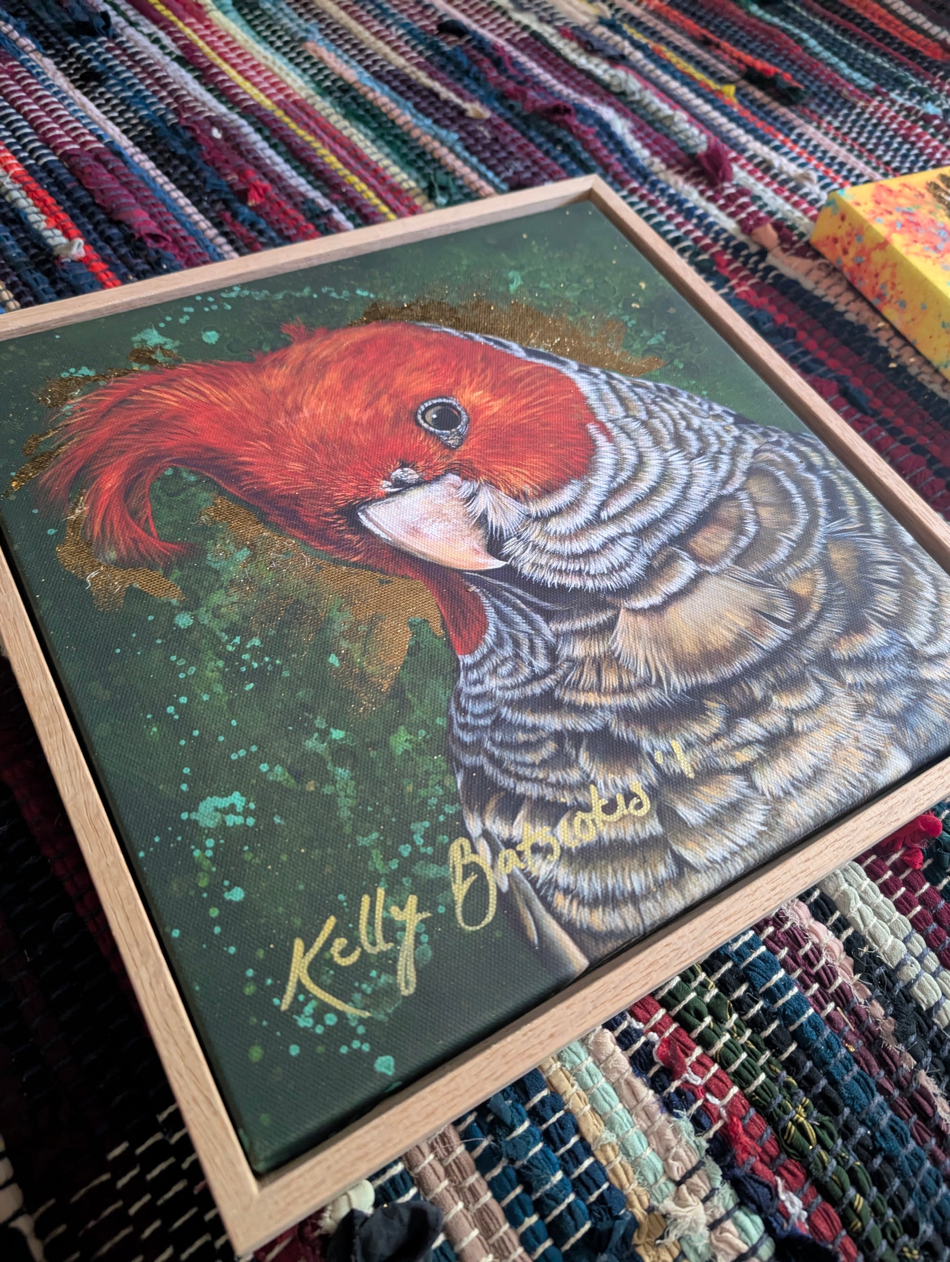 Framed, embellished fine art print of Elvis the Gang Gang Cockatoo by Kelly Batsiokis showing the quality of the frame.