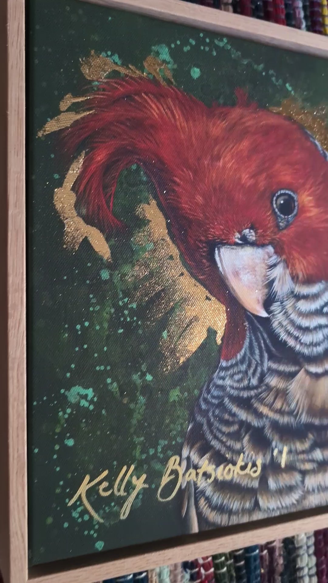 Video of framed, embellished fine art print of Elvis the Gang Gang Cockatoo by Kelly Batsiokis showing the quality of the frame and sheen of the gold-like foil in 3D.