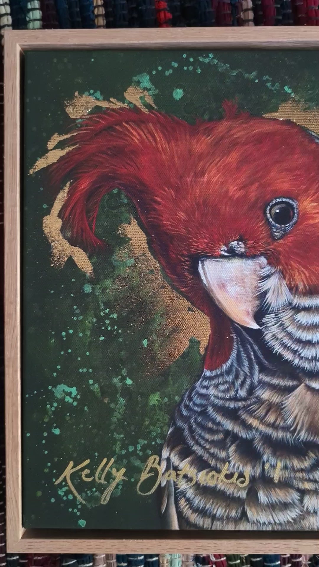 Video of framed, embellished fine art print of Elvis the Gang Gang Cockatoo by Kelly Batsiokis showing the quality of the frame and sheen of the gold-like foil in 3D.